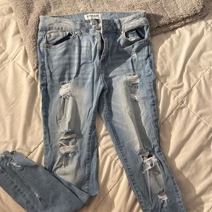 Jeans. Light wash. Ankle cut. Ripped